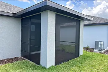 Screen room under existing roof by East Coast Aluminum